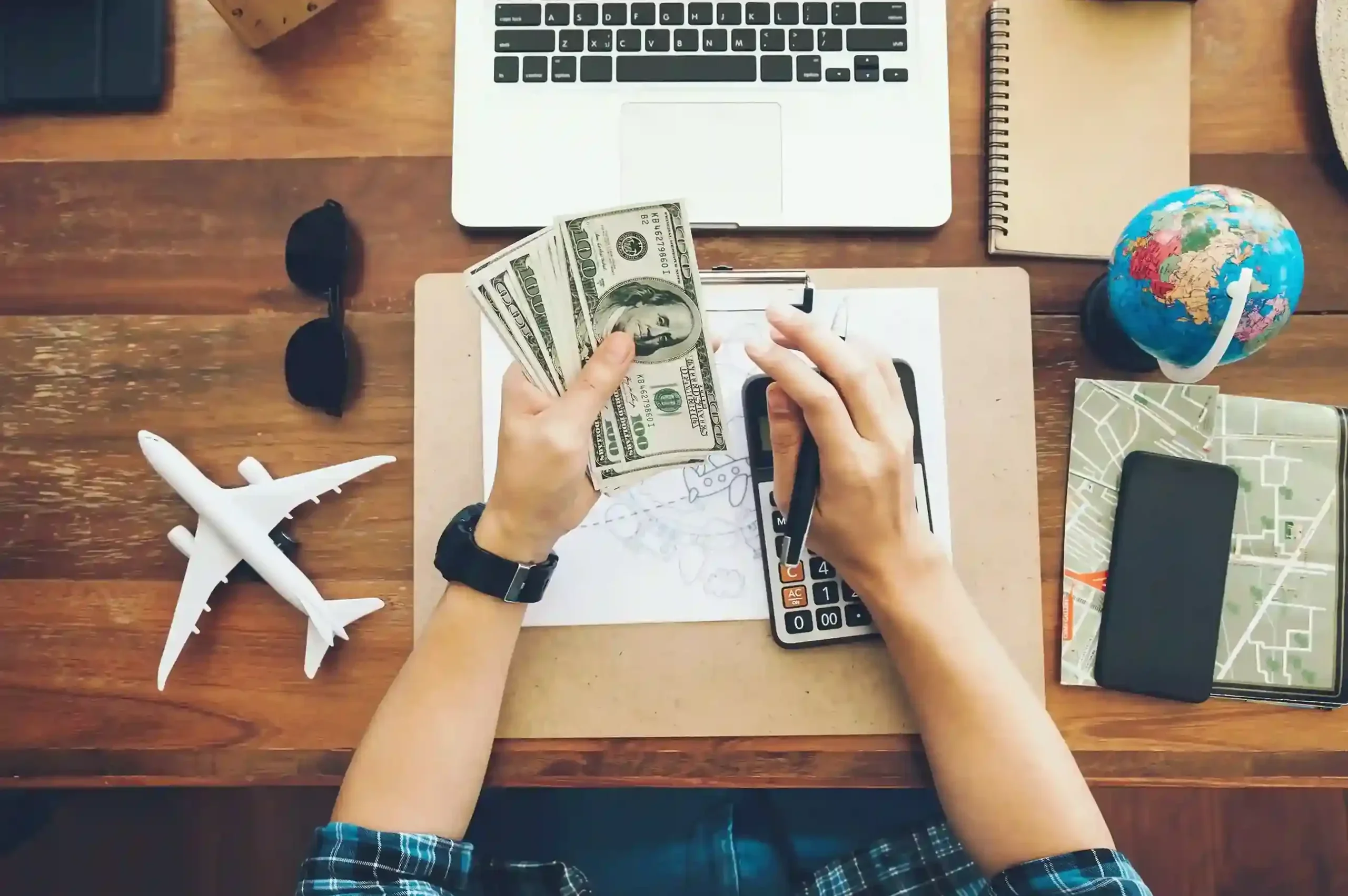 top-view-tourist-counting-cash-spend-his-luxury-vacation_11zon